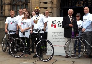 Lord Mayor Magid Magid with his new mayoral bike presented by Russell Cutts of Russell's Bicycle Shed as part of South Yorkshire's Love to Ride programme for 2018: Cllr Magid with fellow riders ready for the Sheffield to the Somme charity ride starting on the 20th June to raise money for the Sheffield Memorial Park dedicated to the Sheffield PALS regiments